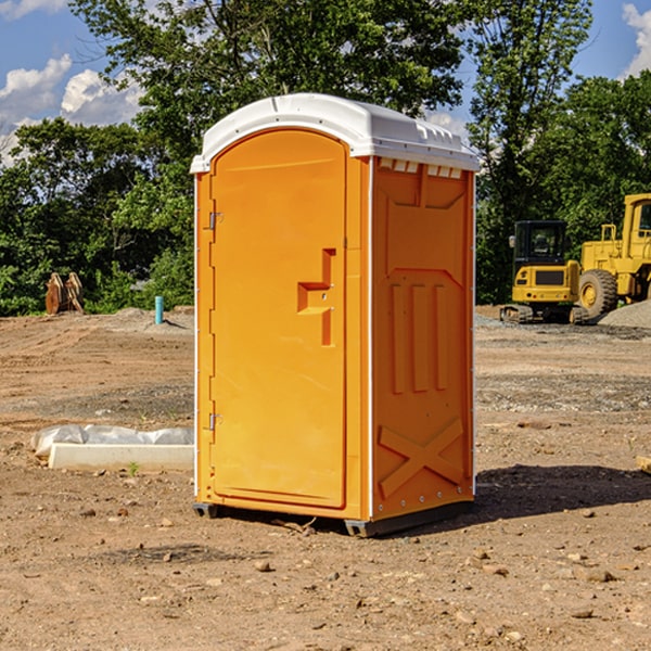 what is the cost difference between standard and deluxe portable restroom rentals in Hettinger County North Dakota